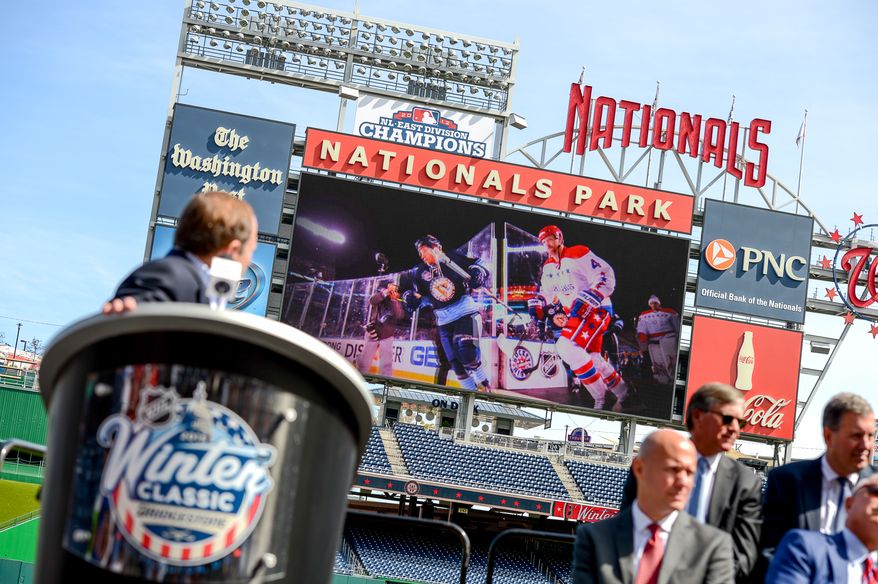 NHL Commissioner Gary Bettman pauses during a press conference to watch a video showcasing the 2015 Bridgestone NHL Winter Classic held at Nationals Park, Washington, D.C., Tuesday, September 23, 2014. (Andrew Harnik/The Washington Times)