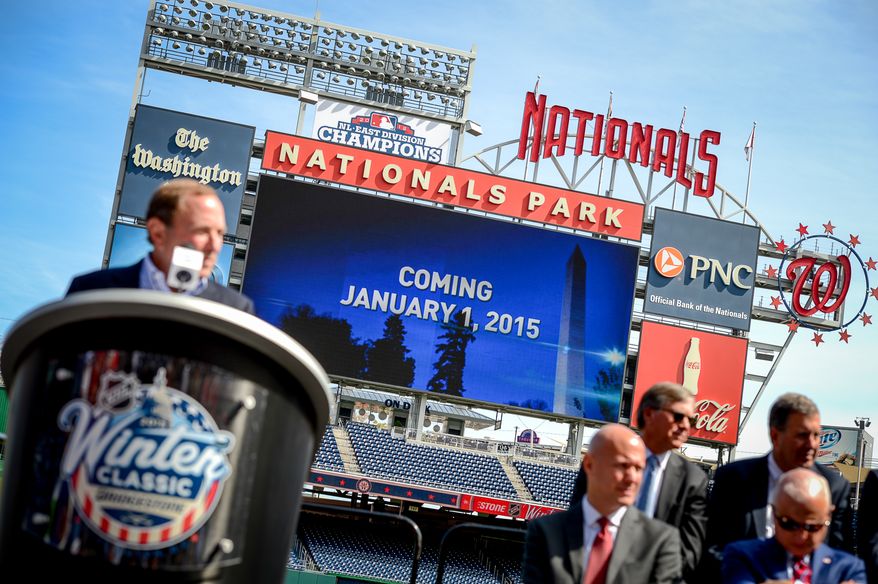 NHL Commissioner Gary Bettman pauses during a press conference to watch a video showcasing the 2015 Bridgestone NHL Winter Classic held at Nationals Park, Washington, D.C., Tuesday, September 23, 2014. (Andrew Harnik/The Washington Times)