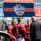 Washington Capitals Senior Vice President and General Manager Brian MacLellan, right, speaks with Washington Capitals Captain Alex Ovechkin, center, Center Nicklas Backstrom, left, and Goaltender Braden Holtby, second from right, speak together following a press conference announcing the 2015 Bridgestone NHL Winter Classic held at Nationals Park, Washington, D.C., Tuesday, September 23, 2014. (Andrew Harnik/The Washington Times)