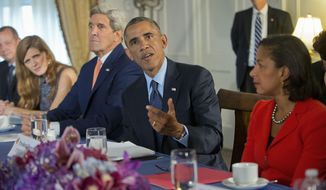 President Obama, flanked by Secretary of State John Kerry and National Security Adviser Susan Rice, speaks  during his meeting with the representatives of Bahrain, Qatar, Saudi Arabia, Jordan, United Arab Emirates and Iraq in New York, Tuesday, Sept. 23, 2014. (Associated Press) ** FILE **