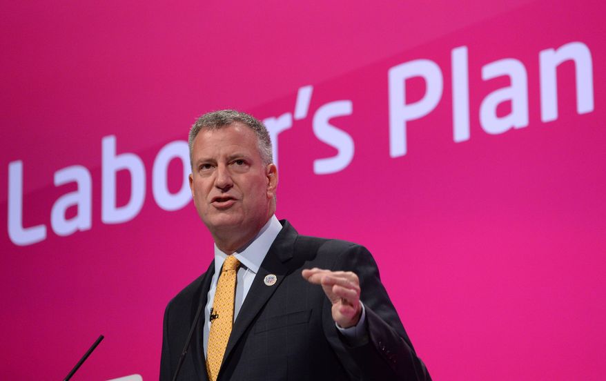 Mayor of New York City Bill de Blasio, addresses the Labour Party conference in Manchester, England, Wednesday, Sept. 24, 2014. (AP Photo/PA, Stefan Rousseau) UNITED KINGDOM OUT NO SALES NO ARCHIVE