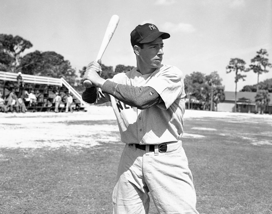 Joe DiMaggio with bat ready at first days workout on March 6, 1946 in Bradenton, Florida after returning from Panama.  DiMaggio has been out since 1942  for with U.S. Army service.   (AP Photo/PS)