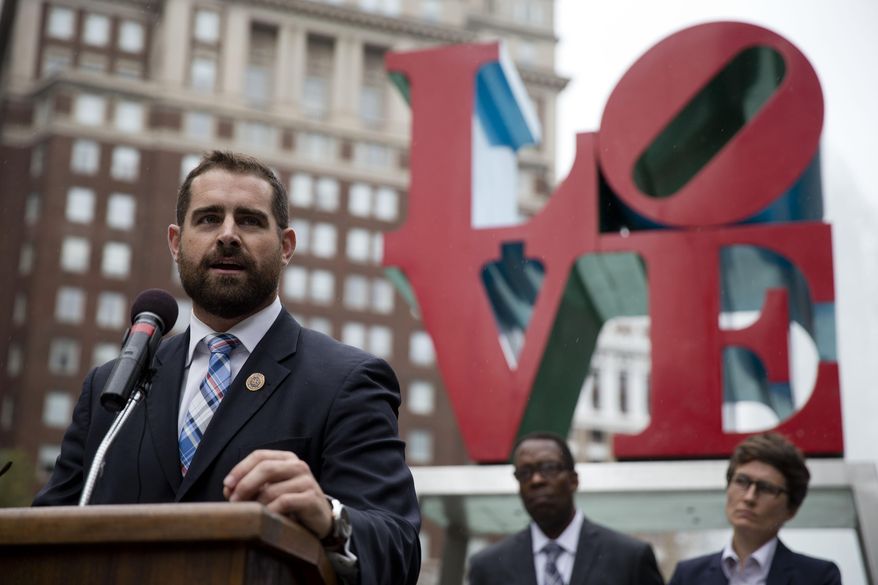 State Rep. Brian Sims, D-Philadelphia, accompanied by other officials, speaks at a protest calling on Pennsylvania to add sexual orientation to its hate crime law at John F. Kennedy Plaza, also known as Love Park, Thursday, Sept. 25, 2014, in Philadelphia. The renewed call for the legislation comes in response to the Sept. 11 beating of a gay couple. (AP Photo/Matt Rourke) ** FILE **