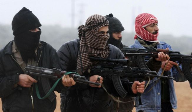 Free Syrian Army members train outside Idlib, Syria, Feb. 7, 2012. (Associated Press) ** FILE ** 