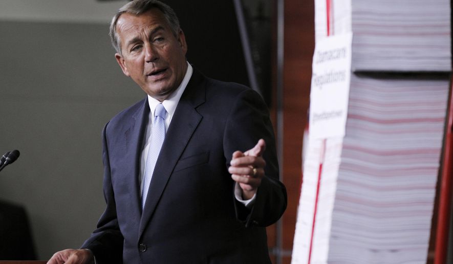 FILE - This May 16, 2013, file photo shows House Speaker, Republican John Boehner of Ohio, indicating a tall stack of paper which represents the 20,000 pages of regulations of the Affordable Care Act regulations during a Capitol Hill news conference in Washington. Confused by the health care law or the debate over government surveillance? You&#39;re not alone. Most Americans think the issues facing the country are getting more complicated. (AP Photo/Molly Riley, File)