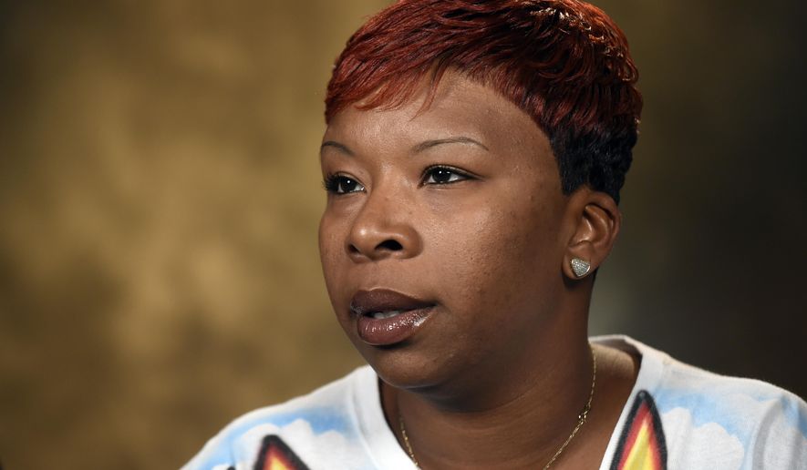 The mother of Michael Brown, Lesley McSpadden, speaks to The Associated Press during an interview in Washington, Saturday, Sept. 27, 2014. Michael Brown&#39;s parents say they are unmoved by the Ferguson police chief&#39;s apology in their son&#39;s shooting death by a police officer. Instead, McSpadden and Michael Brown Sr. told The Associated Press they would rather see an arrest, and Brown Sr. said he wants the police officer &amp;quot;in handcuffs.&amp;quot;  (AP Photo/Susan Walsh)