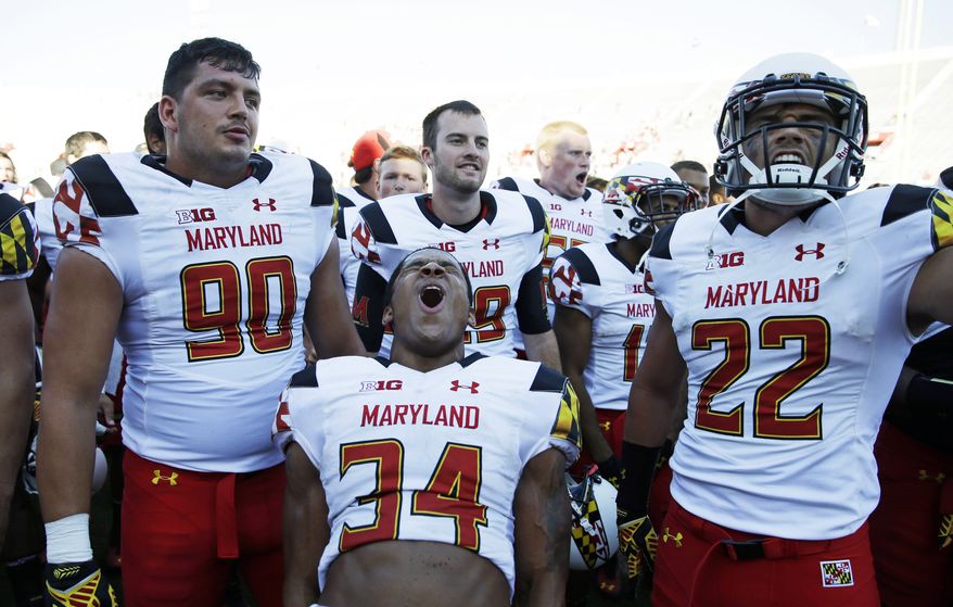 Maryland wide receiver Jacquille Veii (34) react with teammates after Maryland defeated Indiana 37-15 in an NCAA college football game Saturday, Sept. 27, 2014, in Bloomington, Ind. (AP Photo/Darron Cummings) 