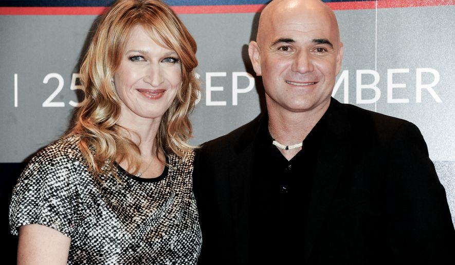 Steffi Graf, left, and Andre Agassi, are wealthy tennis players. Among millionaires, women are preferring conservatives, according to a new study. (Photo by Richard Shotwell/Invision/AP)