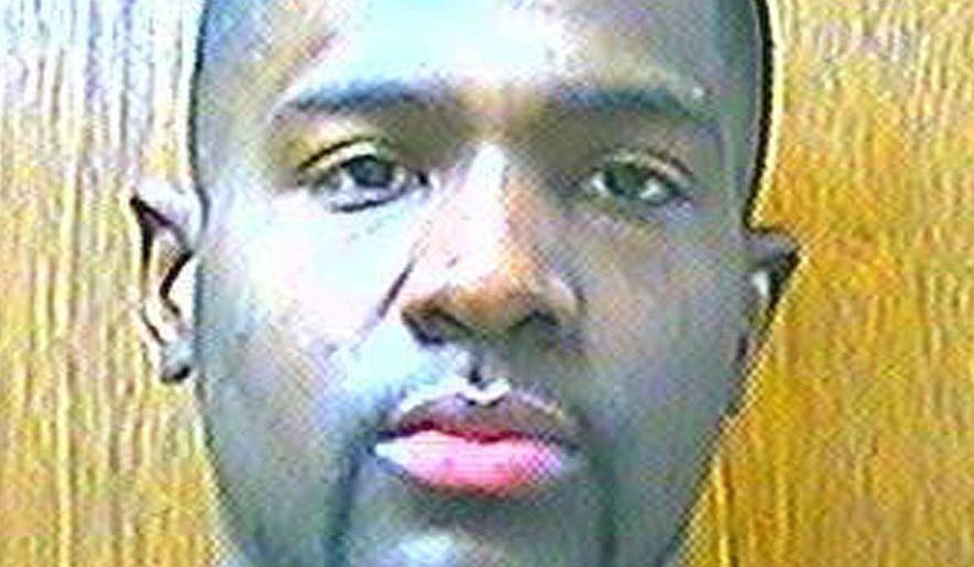 Prison records indicate that Alton Nolen, the suspect in the beheading of a coworker at an Oklahoma food processing plant, had spent time in prison and was on probation for assaulting a police officer. (AP Photo/Oklahoma Department of Corrections)