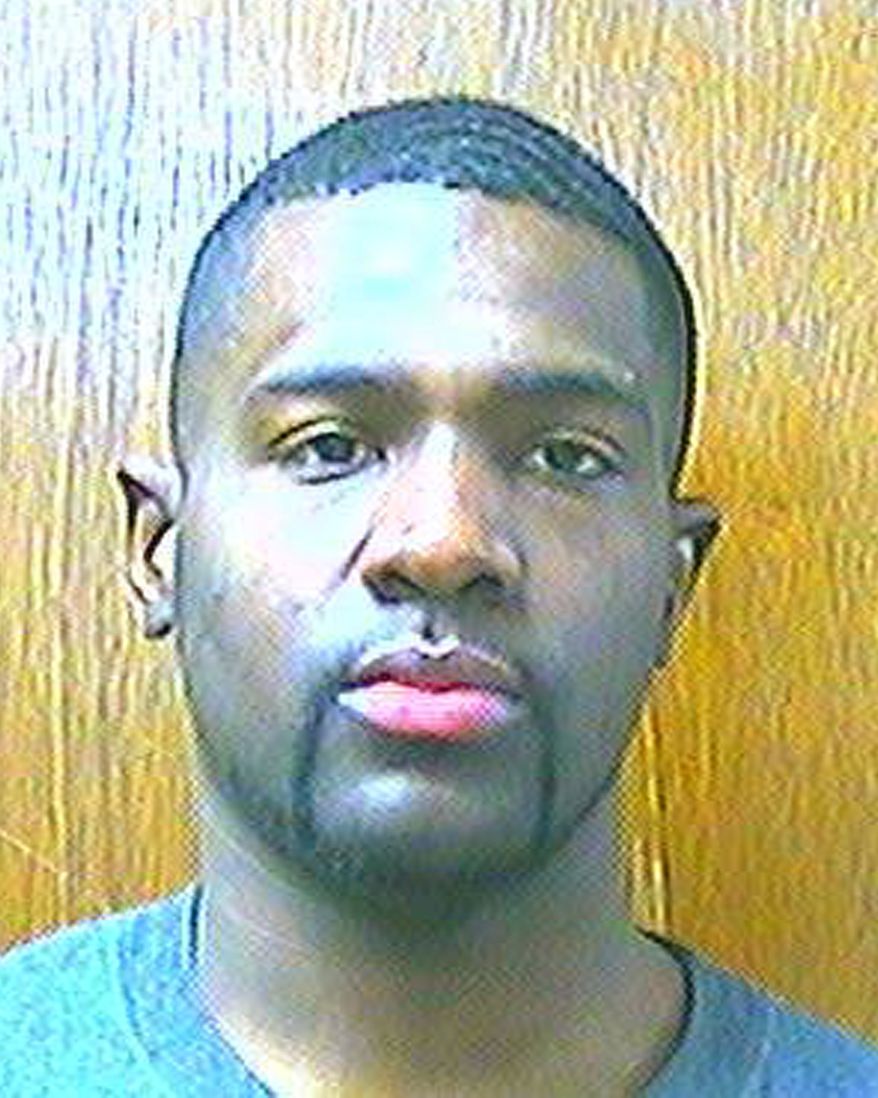 Prison records indicate that Alton Nolen, the suspect in the beheading of a coworker at an Oklahoma food processing plant, had spent time in prison and was on probation for assaulting a police officer. (AP Photo/Oklahoma Department of Corrections)