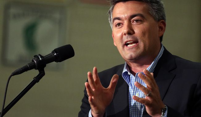 In this Sept. 29, 2014 photo, U.S. Rep. Cory Gardner, who is running for the U.S. Senate seat held by Democratic Senator Mark Udall, speaks at a political rally at Heritage High School, in the Denver suburb of Littleton, Colo. The protests over a Colorado school district’s proposal to promote patriotism and de-emphasize civil disobedience in American history classes have found their way into the state’s marquee midterm election races, injecting a volatile issue two weeks before early voting ballots land in mailboxes across the state. (AP Photo/Brennan Linsley)
