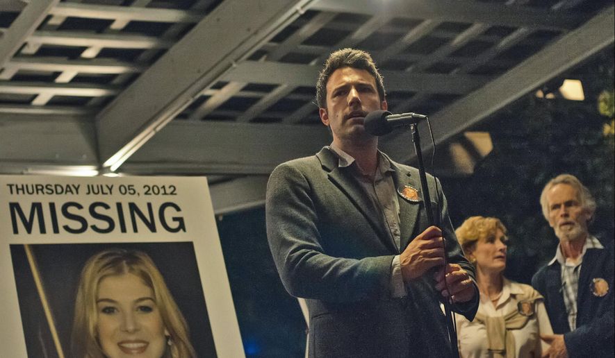 This image released by 20th Century Fox shows Ben Affleck in a scene from "Gone Girl." The 20th Century Fox thriller, which stars Ben Affleck and Rosamund Pike, will premiere in theaters on October 3. (AP Photo/20th Century Fox, Merrick Morton)