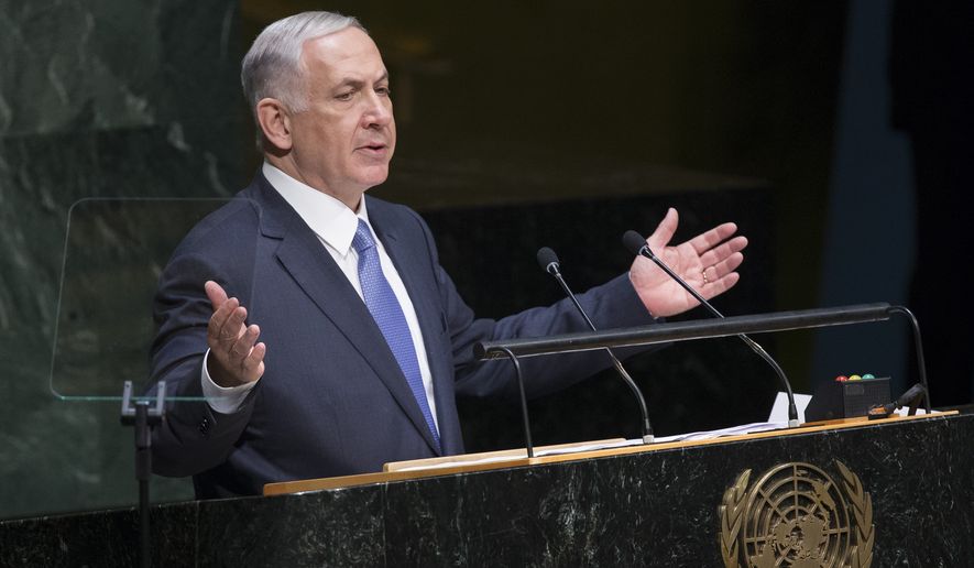FILE -  In this Monday, Sept. 29, 2014 file photo, Israel&#x27;s Prime Minister Benjamin Netanyahu addresses the 69th session of the United Nations General Assembly at U.N. headquarters. In a pair of fiery speeches at the United Nations, the Israeli and Palestinian leaders appear to have abandoned any hope of reviving peace talks and instead seem intent on pressing forward with separate diplomatic initiatives that all but ignore each other. Both plans offer novel attempts at breaking months of deadlock, yet both appear doomed to fail. (AP Photo/John Minchillo, File)
