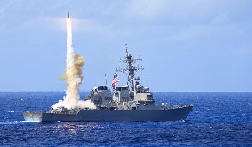 The Arleigh Burke-class guided-missile destroyer USS Curtis Wilbur (DDG 54) fires a Standard Missile 2 (SM-2) during a missile firing exercise. (U.S. Navy photo)