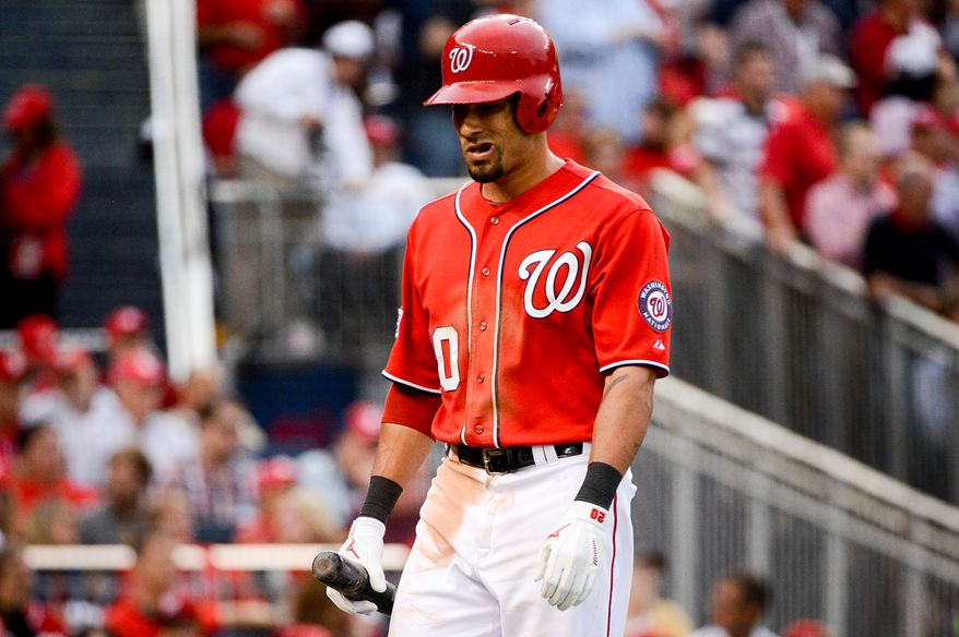 Washington Nationals shortstop Ian Desmond (20) strikes out with bases loaded to end the sixth inning as the Washington Nationals play the San Francisco Giants at Nationals Park for Game 1 of the National League Division Series, Washington, D.C., Friday, October 3, 2014. (Andrew Harnik/The Washington Times)