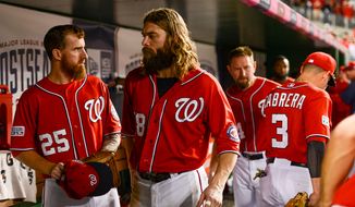 Nationals players head to the locker room after the Washington Nationals lose to the San Francisco Giants 3-2 at Nationals Park for Game 1 of the National League Division Series, Washington, D.C., Friday, October 3, 2014. (Andrew Harnik/The Washington Times)