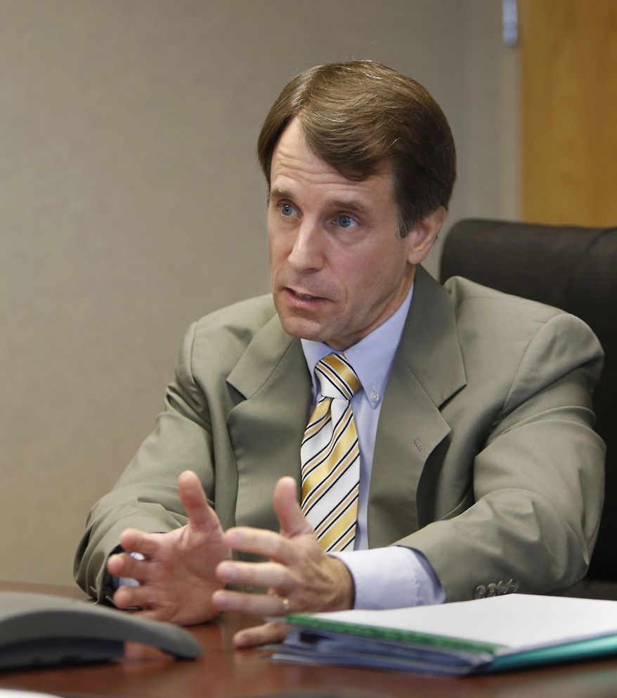 FILE -- In this photo June 24, 2013 file photo is California Insurance Commissioner Dave Jones, a Democrat, during an interview with the Associated Press in Sacramento, Calif. Jone is being challenged for reelection by state Sen. Ted Gaines, R-Granite Bay, a Republican.(AP Photo/Rich Pedroncelli)