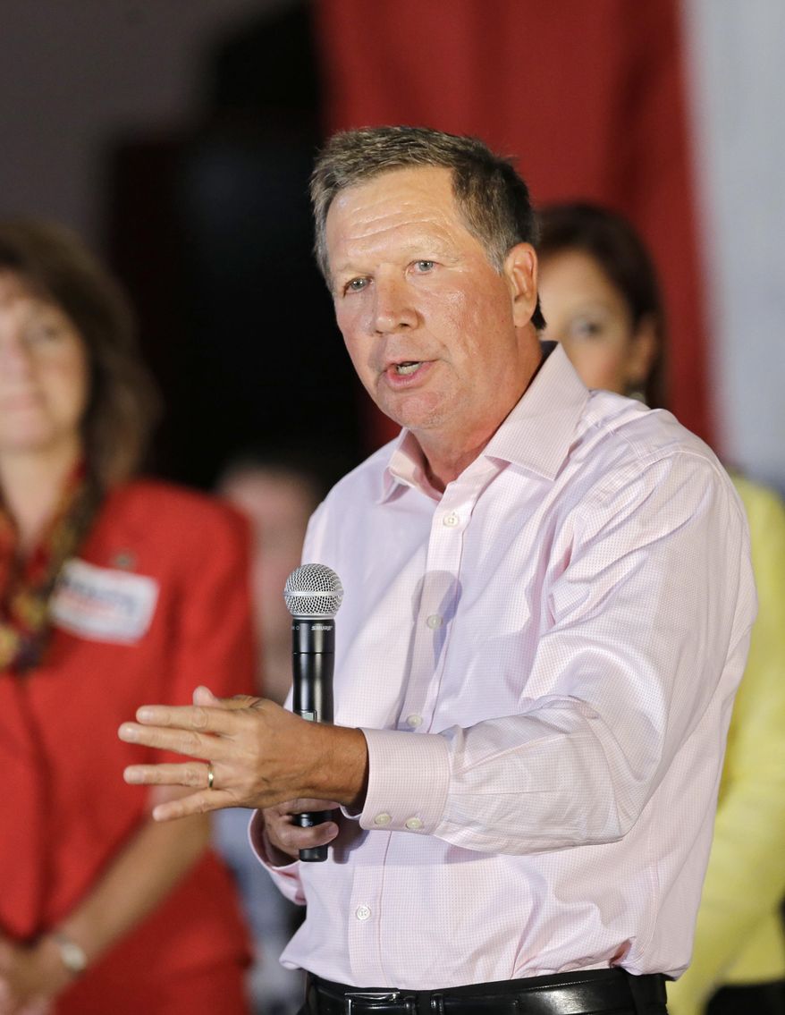 In this Sept. 29, 2014 photo, Pepublican Ohio Gov. John Kasich speaks at a Get Out the Vote rally in Independence, Ohio. Republicans who hold power in Ohio from the Kasich to the Legislature to the state's high court stand very little chance of defeat this fall, as Democrats lag in fundraising, public opinion polls and the invaluable visibility provided by incumbency. (AP Photo/Mark Duncan)