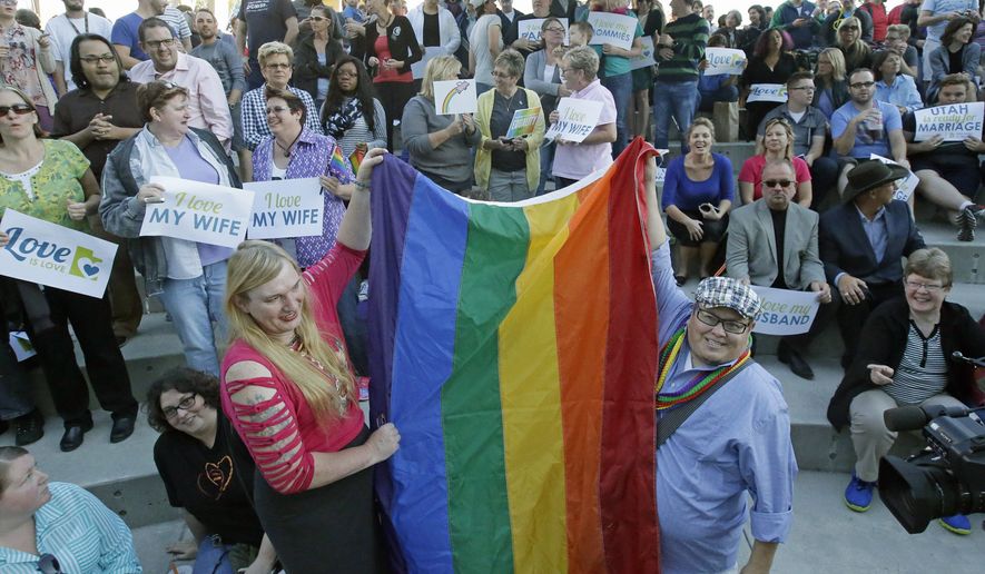 Same-sex couples in Salt Lake City celebrated Monday after the U.S. Supreme Court cleared the way for gay marriages to begin in Utah and 30 other states. However, governors and attorneys general in states like North Carolina, Wyoming and West Virginia maintain the fight for traditional marriage isn&#39;t over. (Associated Press)