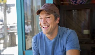 Mike Rowe appears in a promotional shoot for the series &quot;Somebody&#39;s Gotta Do It&quot; in Venice, California, Aug. 21, 2014. (AP Photo/CNN, Jeremy Freeman) ** FILE **