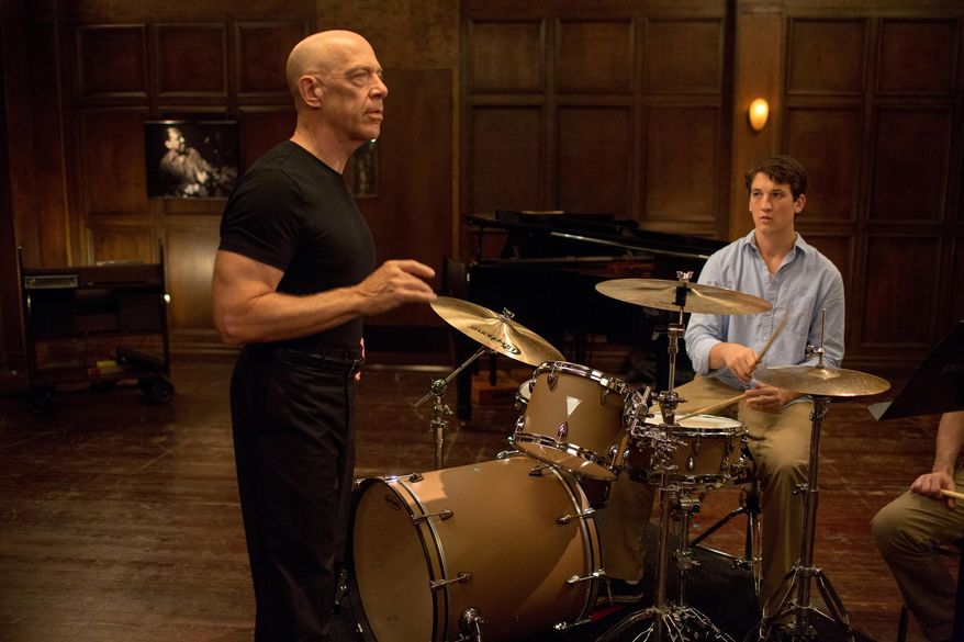 This image released by Sony Pictures Classics shows J.K. Simmons , left, and Miles Teller in a scene from "Whiplash." (AP Photo/Sony Pictures Classics, Daniel McFadden)