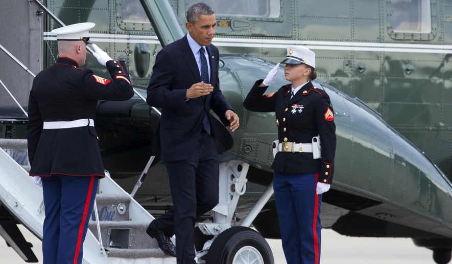President Obama disembarks Marine One to switch to Air Force One at Andrews Air Force Base, Md., Tuesday, Oct. 7,  2014, for a trip to New York City and Greenwich, Conn. (Associated Press) ** FILE **
