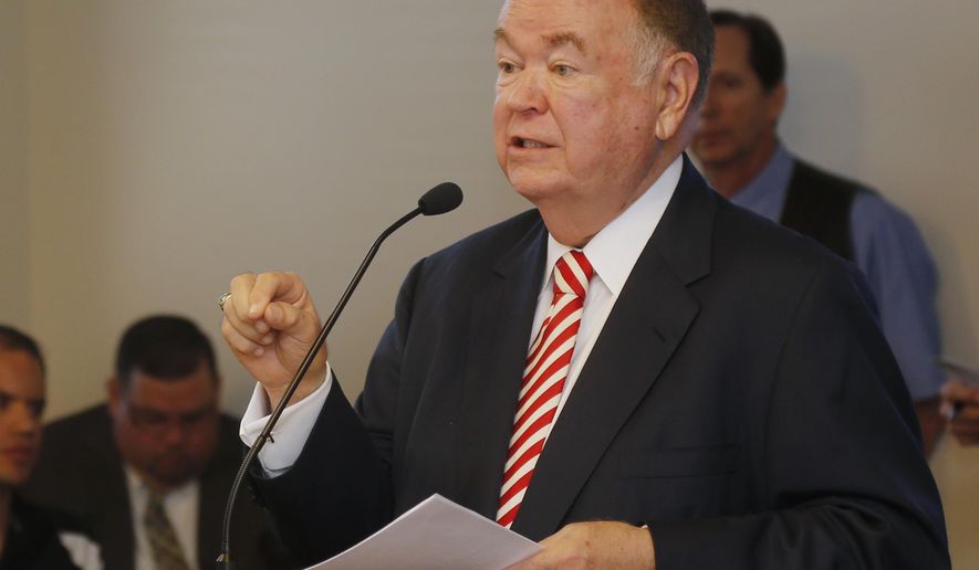 University of Oklahoma President David Boren speaks to a  joint hearing of the Oklahoma House committees on public safety and higher education in Oklahoma City, Wednesday, Oct. 8, 2014. Boren said that allowing more students and faculty members at colleges and universities to carry guns on campus would be a serious mistake and jeopardize the safety of the public. (AP Photo/Sue Ogrocki)