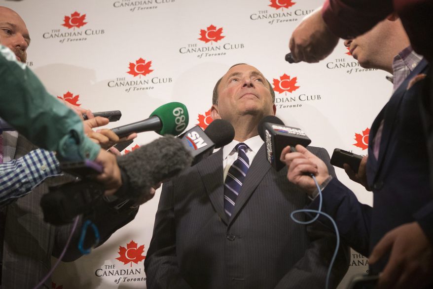 NHL Commissioner Gary Bettman talks with the media about the upcoming hockey season in Toronto on Monday Sept. 22, 2014. (AP Photo/The Canadian Press, Chris Young)