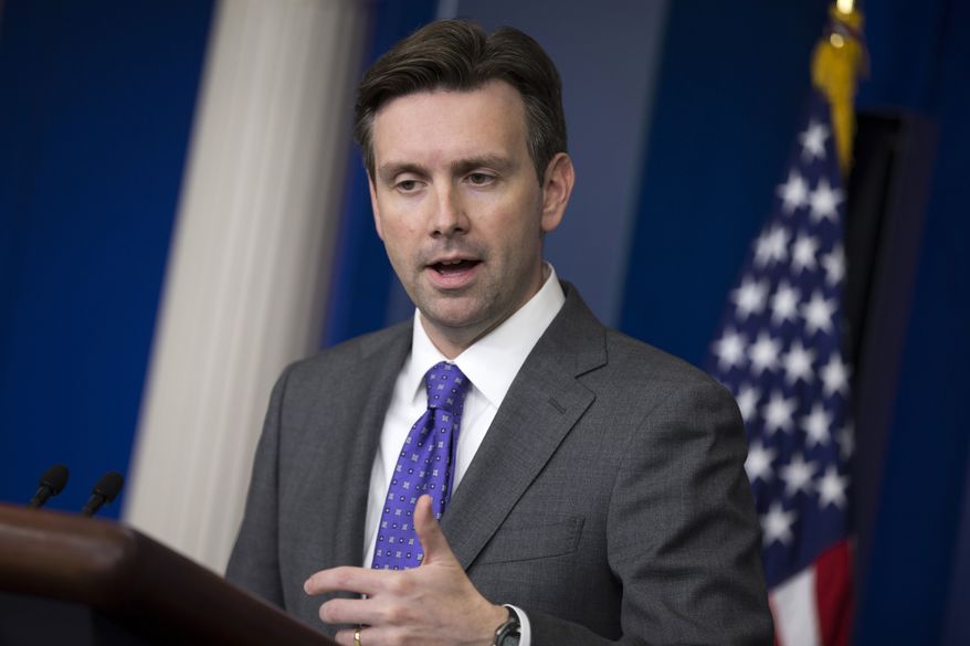 White House press secretary Josh Earnest gestures as he answers a question during the daily press briefing at the White House in Washington, Wednesday, Oct. 8, 2014. (Associated Press)