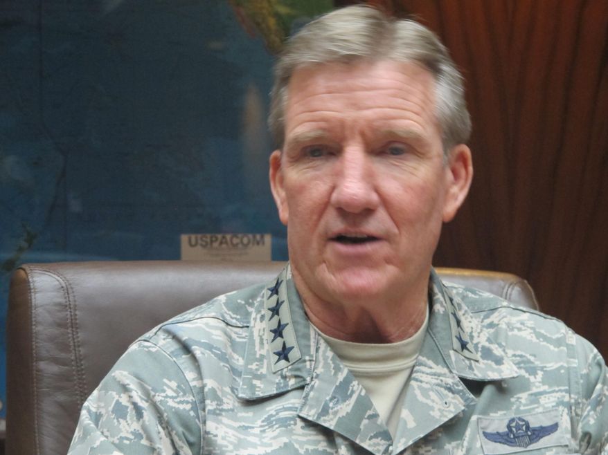 Gen. Herbert Carlisle speaks to reporters at Joint Base Pearl Harbor-Hickam, Hawaii on Thursday, Oct. 9, 2014. Carlisle said there have been some unsafe midair encounters after China declared an air defense identification zone over disputed islands in the East China Sea, like a Chinese jet that came within 30 feet of a U.S. Navy P-8 Poseidon plane in August, but most interactions between different countries’ aircraft have been very safe to a large extent. (AP Photo/Audrey McAvoy)