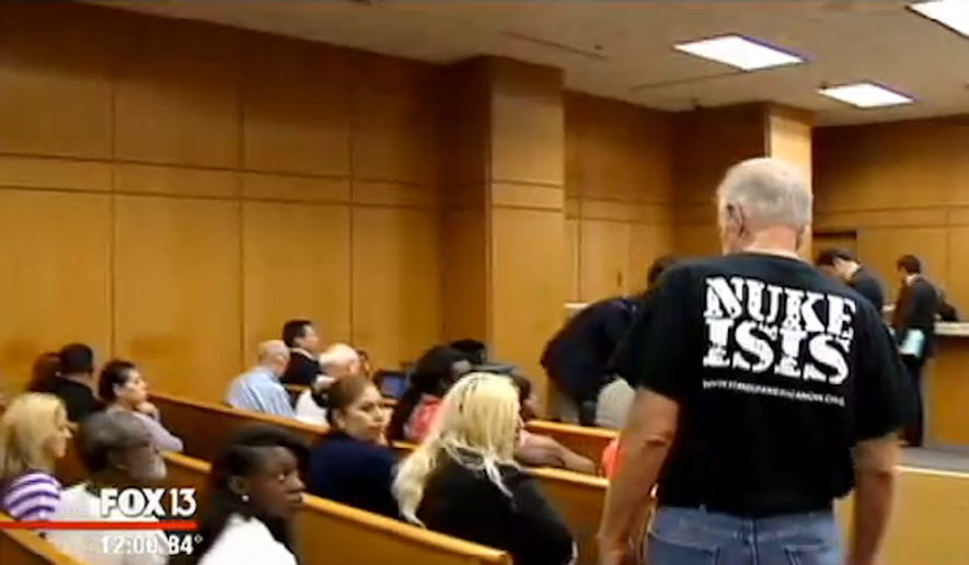 Pastor Terry Jones, an anti-Islam Florida pastor who was arrested last year on his way to burn 3,000 Korans, showed up in Polk County court Tuesday morning wearing a &quot;NUKE ISIS&quot; T-shirt. (FOX 13)