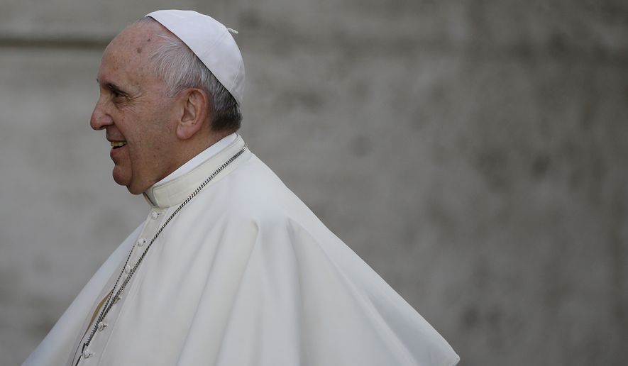 Pope Francis arrives for an afternoon session of a two-week synod on family issues at the Vatican, Thursday, Oct. 9, 2014. (AP Photo/Gregorio Borgia)