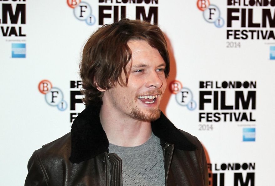FILE - In this Thursday, Oct. 9 2014 file photo, actor Jack O'Connell poses for photographers upon arrival at the premiere of the film 71 during the BFI London Film Festival in central London. Jack O'Connell, 24, is a hot property right now. Following his much-acclaimed performance earlier this year in the angry prison drama "Starred Up," now he is receiving rave reviews for his part in director Yann Demange's high-octane debut "'71.", which will be followed up with his highly anticipated role in director Angelina Jolie's "Unbroken" later this year. (Photo by Grant Pollard/Invision/AP, file)