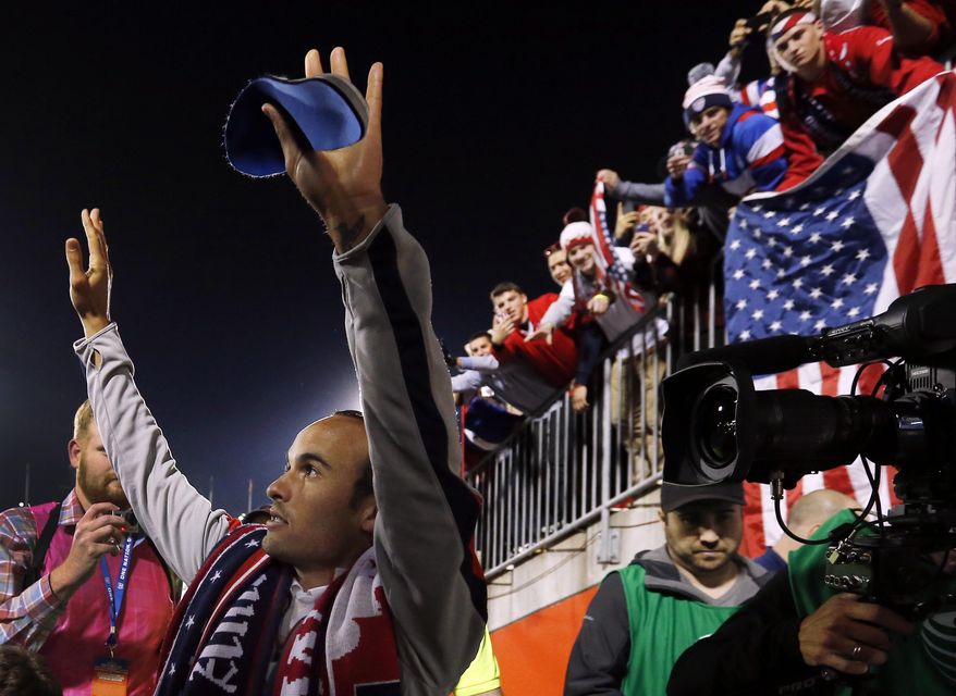 United States' Landon Donovan waves to fans after an exhibition soccer match against Ecuador in East Hartford, Conn., Friday, Oct. 10, 2014. Donovan made his last international soccer appearance. (AP Photo/Elise Amendola)