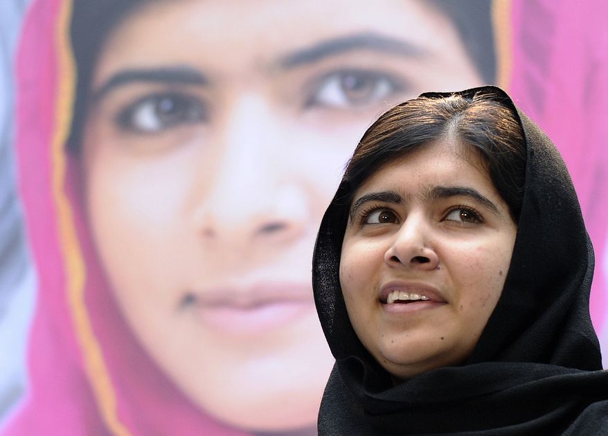 In this file photo taken Friday, Oct. 11, 2013, Malala Yousafzai speaks about her fight for girls' education on the International Day of the Girl at the World Bank in Washington. Teenage activist Malala Yousafzai has jointly won the Nobel Peace Prize for her "heroic struggle" for girls' rights to education, it is announced Friday Oct. 10, 2014. (AP Photo/Susan Walsh, File)