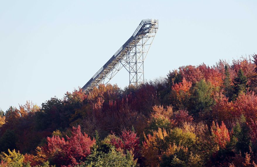 This photo taken Friday Sept. 26, 2014 shows the top of the Nansen Ski jump above the top of the tree line in Milan, N.H. The legendary ski jump for decades lured some of the biggest names in jumping and was host to Olympic tryouts, World Cup competitions and four national championships before its last competition in 1985. Now members of the Nansen Ski Club, local historians and the state Department of Resources and Economic Development are hoping to revive the dilapidated jump and make it a tourist attraction (AP Photo/Jim Cole)