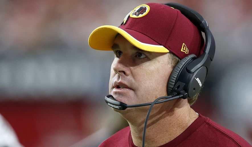 Washington Redskins head coach Jay Gruden paces on the sidelines during the second half of an NFL football game against the Arizona Cardinals Sunday, Oct. 12, 2014, in Glendale, Ariz. The Cardinals defeated the Redskins 30-20. (AP Photo/Ross D. Franklin)