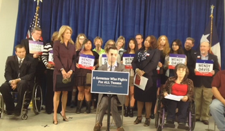 Texas Democratic gubernatorial candidate Wendy Davis appears at a press conference on October 13, 2014 to defend her controversial &quot;wheelchair&quot; ad against opponent Greg Abbott (screenshot via The Daily Caller).