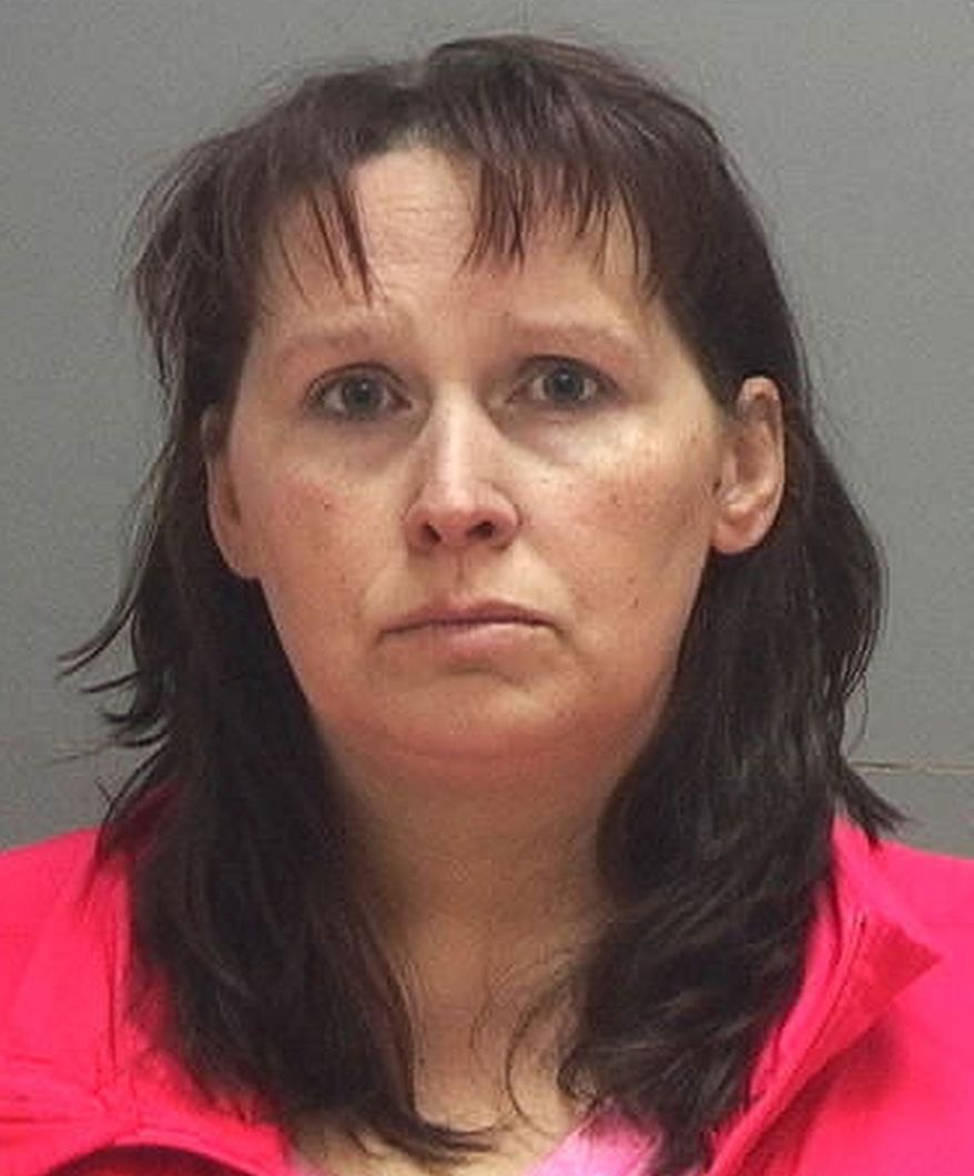 This Oct. 13, 2014 photo provided by the Salt Lake County Sheriff's Office shows Lycia Martinez, 39. Martinez, a Utah school bus driver was arrested Monday, Oct. 13, 2014 on suspicion of DUI after swerving lanes and nearly hitting a car on a busy stretch of highway while taking 67 elementary-school students on a field trip. Authorities suspect Martinez, had taken prescription anti-anxiety/muscle-relaxer pills, which were found in her purse, Utah Highway Patrol Sgt. Blaine Robbins said. (AP Photo/Salt Lake County Sheriff's Office)