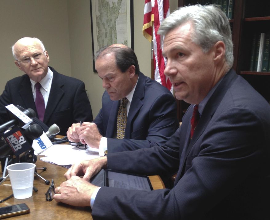 U.S. Sen. and former U.S. attorney Sheldon Whitehouse, right, former U.S. Attorney Robert Clark Corrente, center, and Phil West, retired head of the government watchdog group Common Cause of Rhode Island, speak to media in Providence, R.I., Tuesday, Oct. 14, 2014, about the candidacy of former Providence Mayor Buddy Cianci. They called a possible third Cianci administration an "alarming prospect" and said there's no reason to believe Cianci has changed after two felony convictions. (AP Photo/Jennifer McDermott)