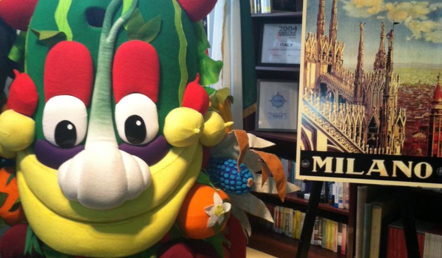 Foody, the mascot for the Milan Expo, is displayed at the offices of the Italian National Tourist Board in New York on Tuesday, Oct. 14, 2014. Food will be the primary theme of the Expo, which is the modern incarnation of the old world's fair. The event opens in May for six months and officials say they expect 20 million visitors, with more than a third coming from outside Italy. (AP Photo/Beth J. Harpaz)