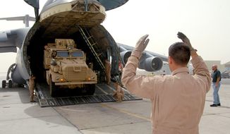 A Mine Resistant Ambush Protected vehicle (MRAP) is unloaded from a C-5 Galaxy on Sept. 25, 2008 at an air base in Southwest Asia. (Image: U.S. Air Force)