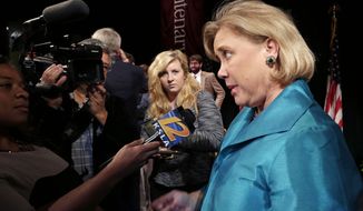 Sen. Mary Landrieu, D-La., talks to the media after her debate with Senate candidate Rep. Bill Cassidy, R-La., and Republican candidate Rob Maness at Centenary College in Shreveport, La., Tuesday, Oct. 14, 2014. (AP Photo/Gerald Herbert)