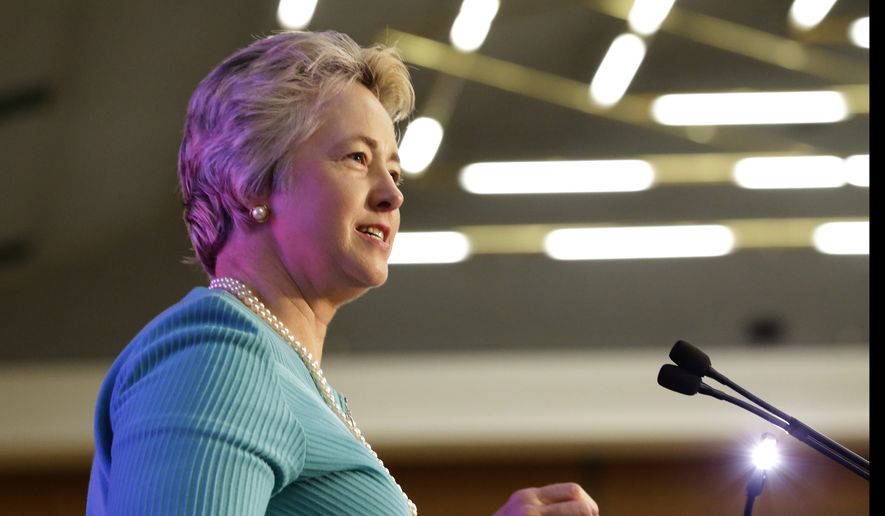 Houston Mayor Annise Parker backed down Wednesday from the city&#39;s effort to force local pastors to turn over speeches and papers related to a hotly contested transgender rights ordinance. (Associated Press)