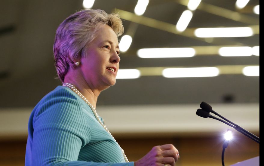 Houston Mayor Annise Parker backed down Wednesday from the city&#39;s effort to force local pastors to turn over speeches and papers related to a hotly contested transgender rights ordinance. (Associated Press)