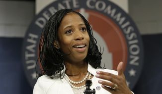 Republican Mia Love speaks to reporters following her debate with Democrat Doug Owens in their race for Utah&#39;s 4th Congressional District Tuesday, Oct. 14, 2014, in Salt lake City. The Tuesday night debate is the final one this year from the new Utah Debate Commission. (AP Photo/Rick Bowmer)