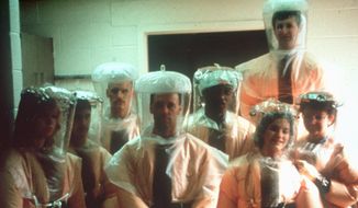 Outbreak: A 1989 Veterinary Medicine Division team at the U.S. Army Medical Research Institute of Infectious Diseases (USAMRIID) found Ebola could be spread airborne in primates. (Associated Press)