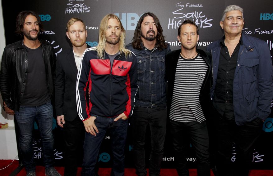 Rami Jaffee, from left, Nate Mendel, Taylor Hawkins, Dave Grohl, Chris Shiflett and Pat Smear attend the premiere of HBO's "Foo Fighters Sonic Highway" on Tuesday, Oct. 14, 2014, In New York. (Photo by Andy Kropa/Invision/AP)
