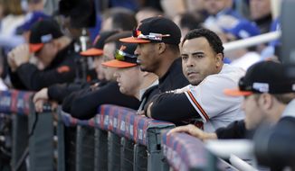 Baltimore Orioles&#39; Nelson Cruz watches during the sixth inning of Game 4 of the American League baseball championship series against the Kansas City Royals Wednesday, Oct. 15, 2014, in Kansas City, Mo. (AP Photo/Matt Slocum ) 