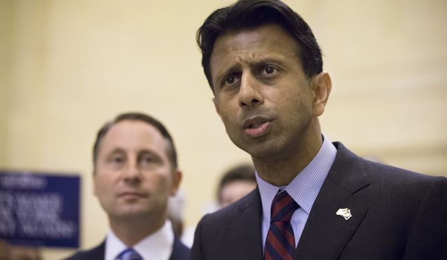 Louisiana Gov. Bobby Jindal, R-La., speaks alongside Rob Astorino, New York republican gubernatorial candidate, during a news conference to discuss New York Gov. Andrew Coumo&#x27;s response to questions about the states preparations against the Ebola virus at Grand Central Station, Thursday, Oct. 16, 2014, in New York. (AP Photo/John Minchillo)
